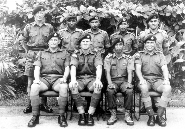 Ashdown (first row, second from left) training border guards in Singapore, 1966. 
