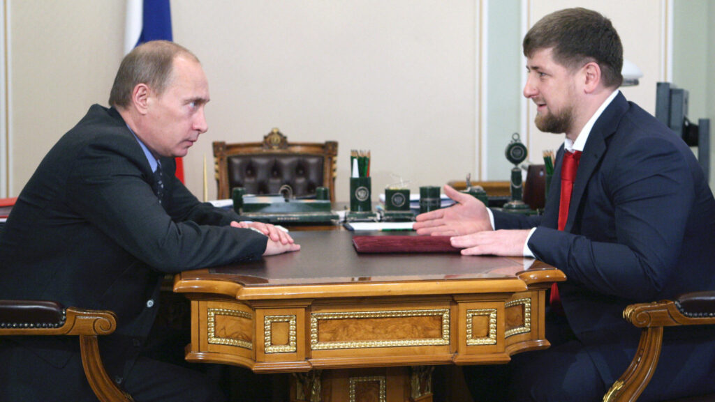 Photograph of Vladimir Putin sat across from Ramzan Kadyrov