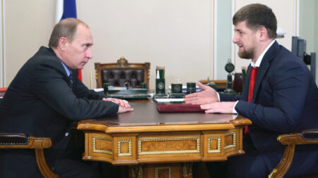 Photograph of Vladimir Putin sat across from Ramzan Kadyrov