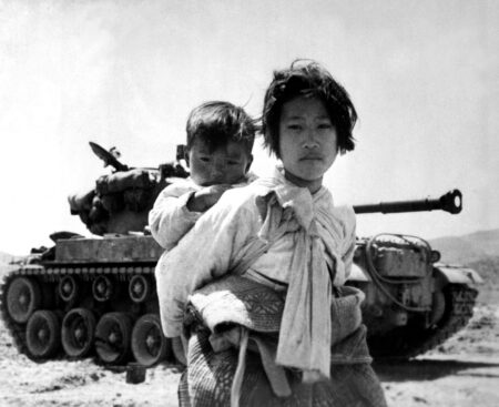 Korean War Refugee With Baby black and white photograph