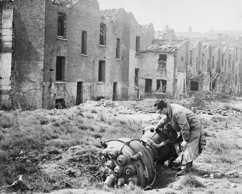 The wreckage of a V2 rocket is examined in London.